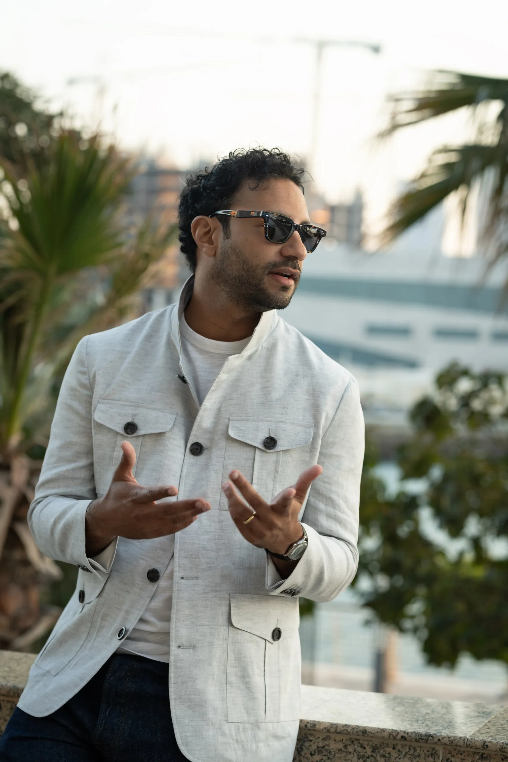 Man in a tailored white outfit