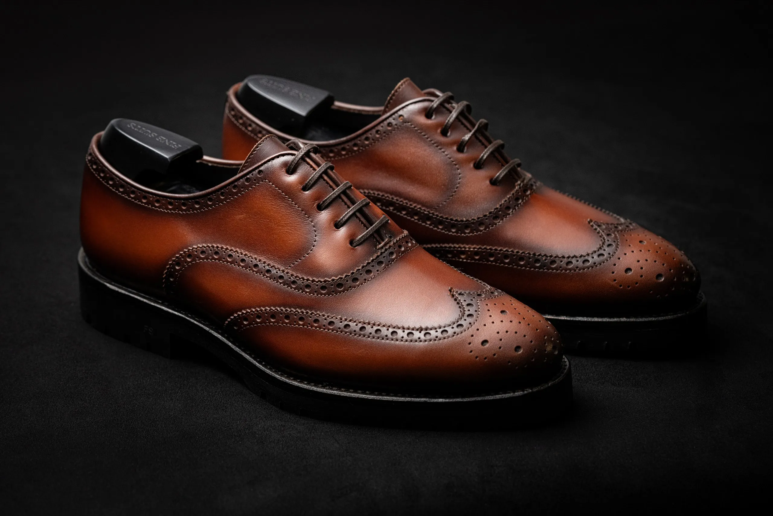 Pair of brown leather dress shoes