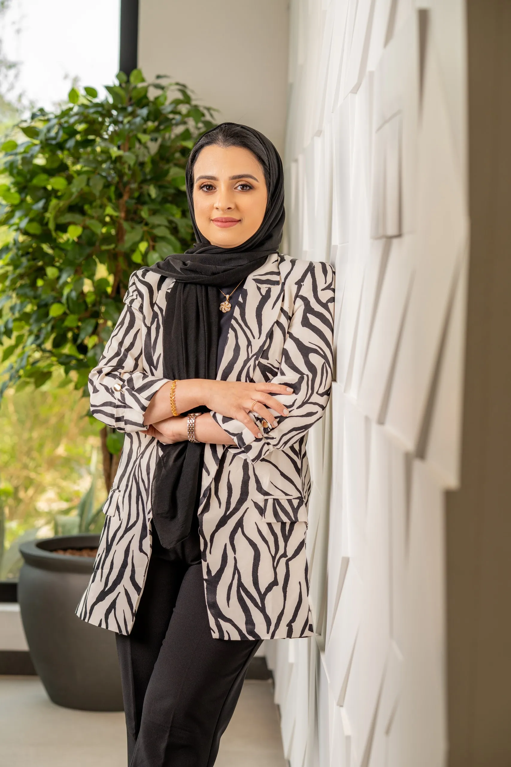 Woman in a zebra-print blazer