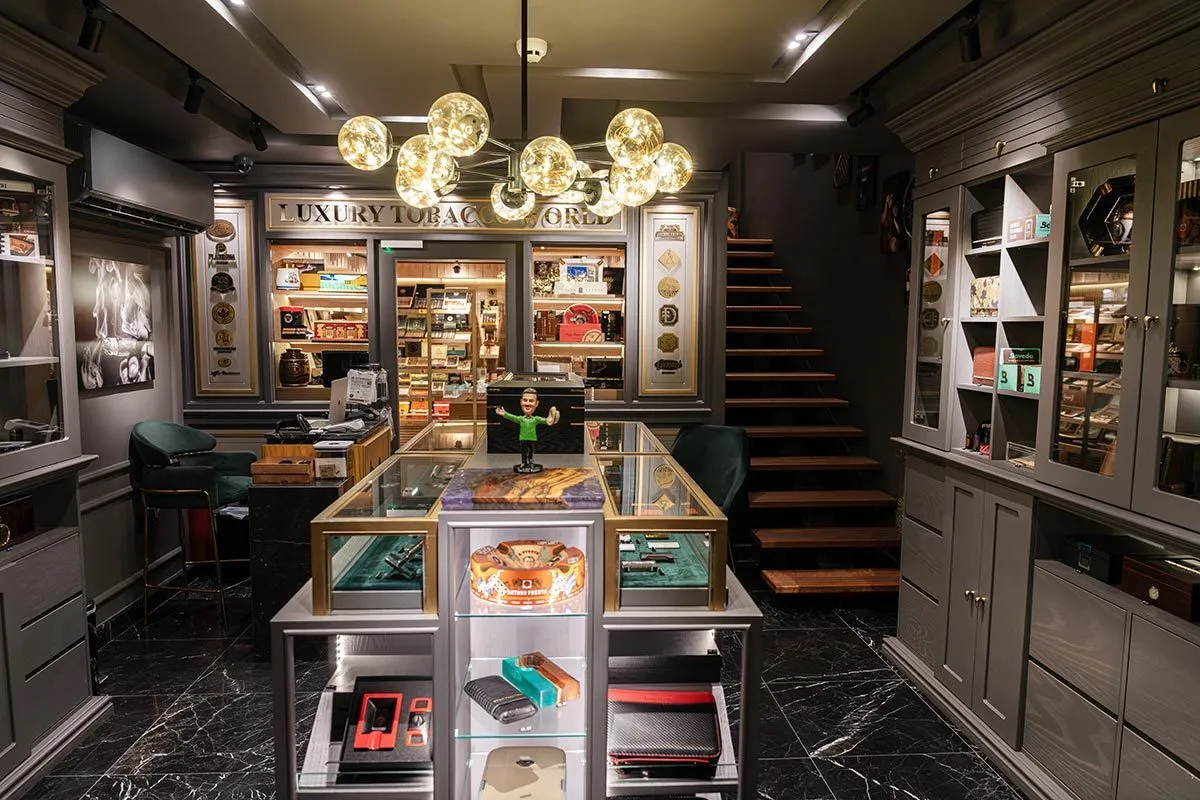 Dark retail interior with backlit shelving