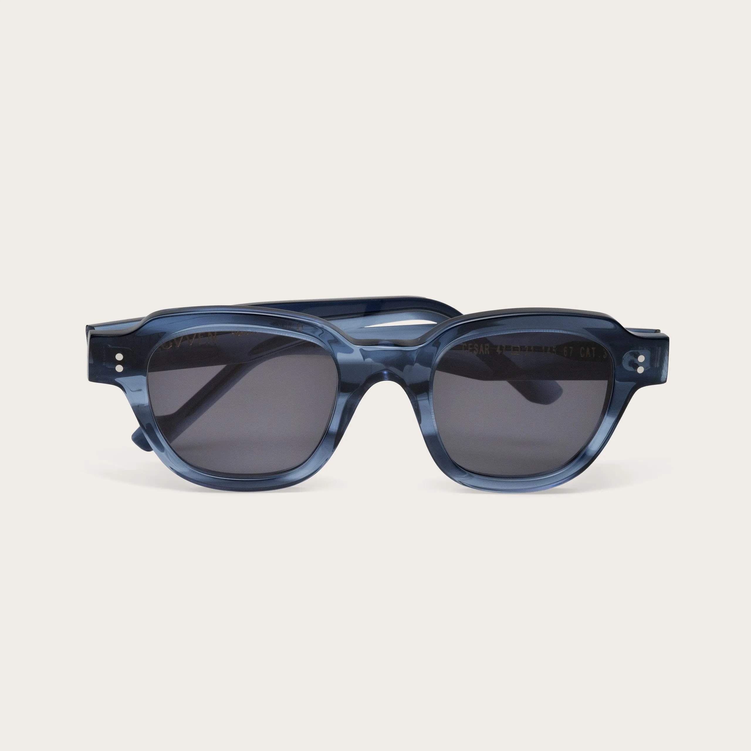 Black sunglasses on a neutral background
