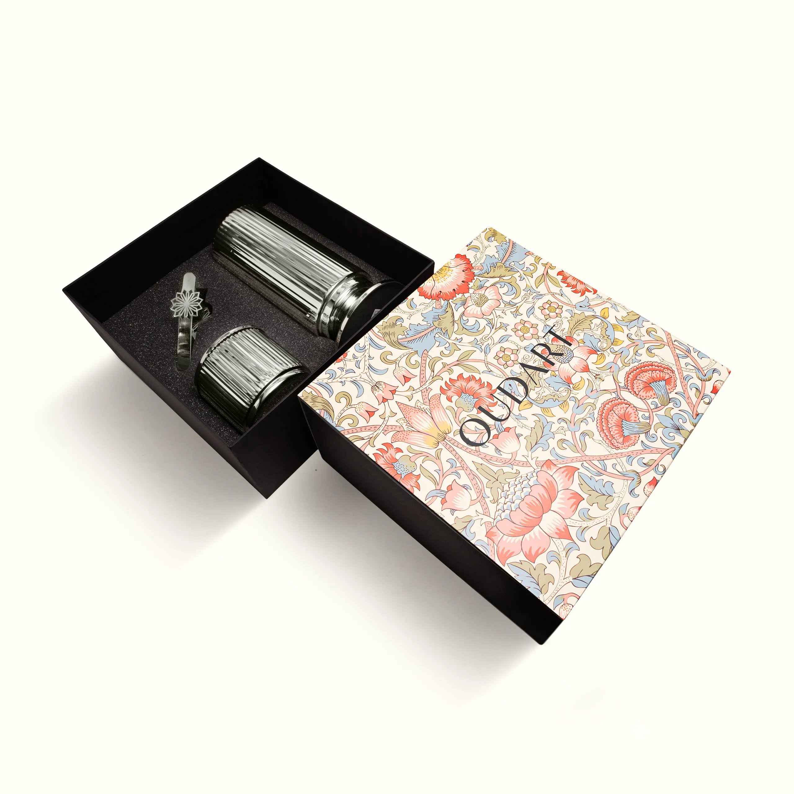Open gift box with a patterned sleeve