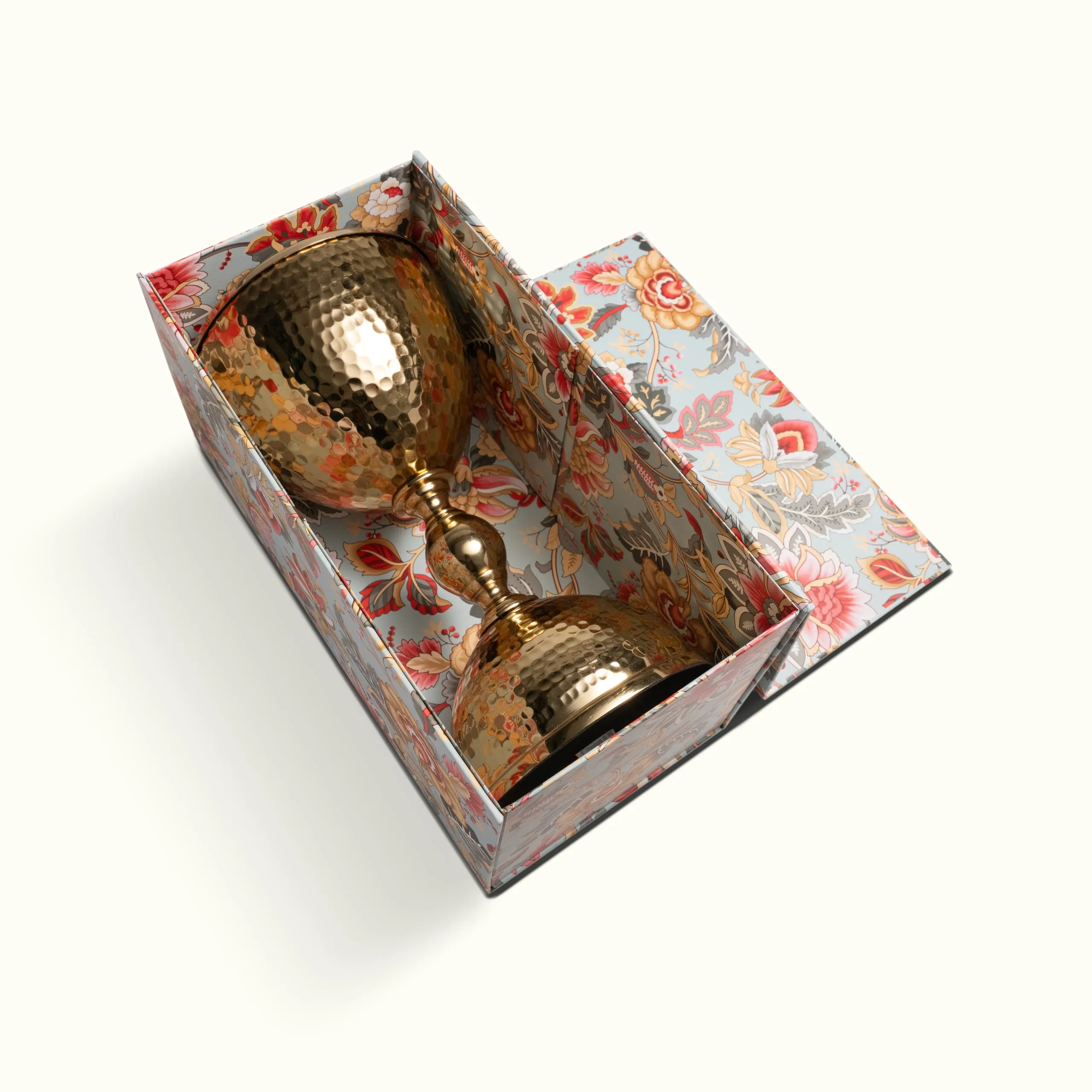 Open gift box with arranged products